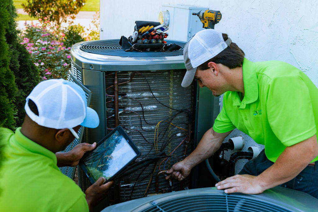 AirSouth Technicians with Air Conditioner