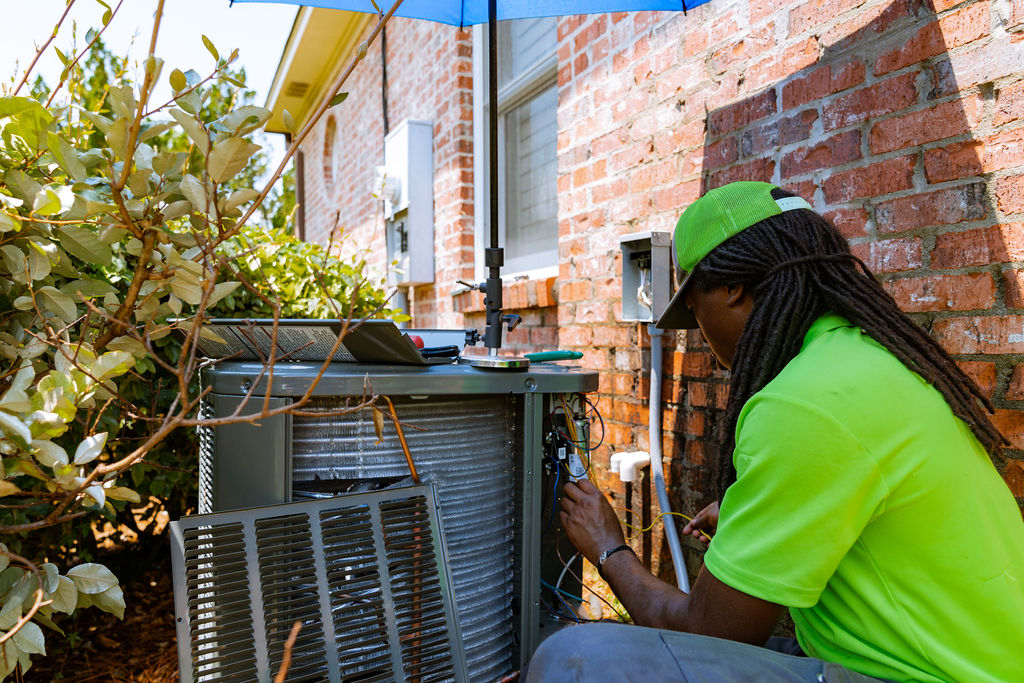 AirSouth Technicians with Air Conditioner